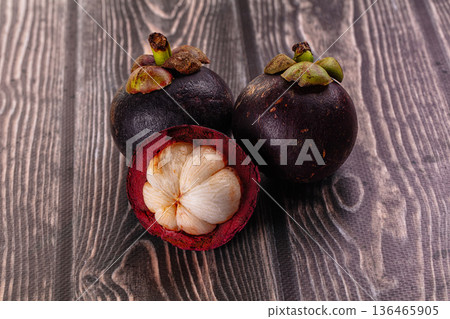 Ripe sweet juicy tropical mangosteen Ripe sweet juicy tropical mangosteen 136465905