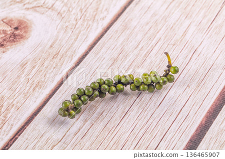 Ripe green pepper corn branch 136465907