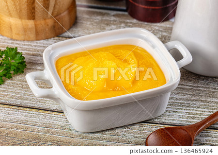 Golden Ghee melted homemade butter Golden Ghee melted homemade butter 136465924