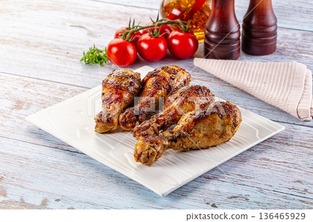 Baked chicken drumsticks with spices 136465929