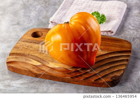 Yellow ripe juicy heart tomato 136465954
