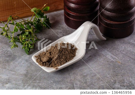 Ground dry black pepper powder Ground dry black pepper powder 136465956