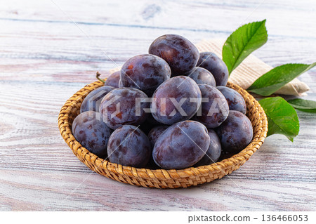 Juicy sweet ripe blue plums Juicy sweet ripe blue plums 136466053