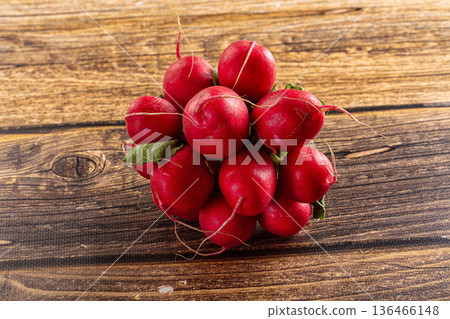 Ripe raw red radish heap 136466148