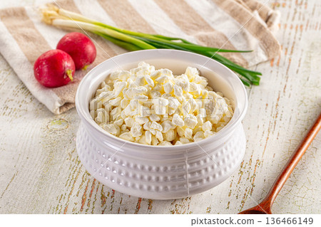 Grain cottage cheese in the bowl Grain cottage cheese in the bowl 136466149