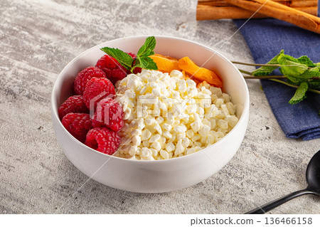 Grain cottage cheese with raspberries Grain cottage cheese with raspberries 136466158