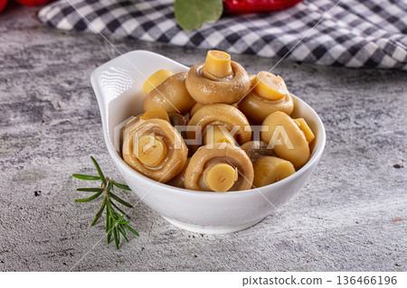 Marinated pickled champignon in the bowl Marinated pickled champignon in the bowl 136466196