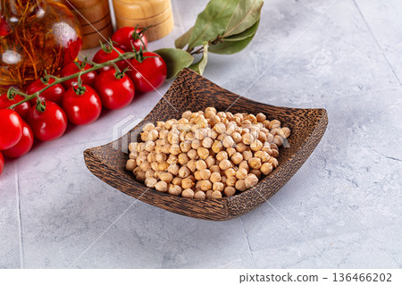 Raw dry chickpeas in the bowl Raw dry chickpeas in the bowl 136466202