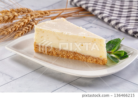Slice of New York classic cheesecake 136466215