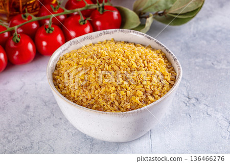 Raw dry bulgur wheat cereal Raw dry bulgur wheat cereal 136466276