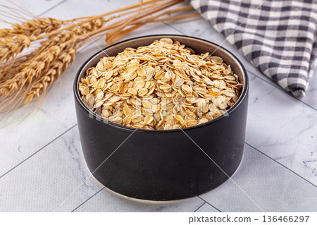 Dry oat flakes for porrige Dry oat flakes for porrige 136466297