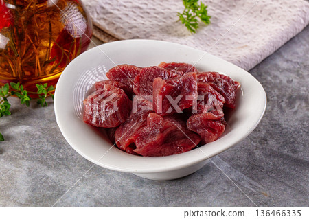 Diced raw beef meat cubes Diced raw beef meat cubes 136466335