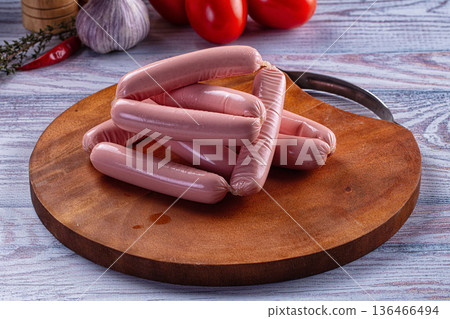Boiled pork meat sausages heap 136466494