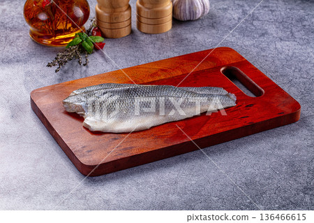 Raw seabass fish fillet for cooking 136466615