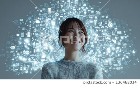 Image of a smiling young woman picturing business opportunities and visions for the future Image of a smiling young woman picturing business opportunities and visions for the future 136468034