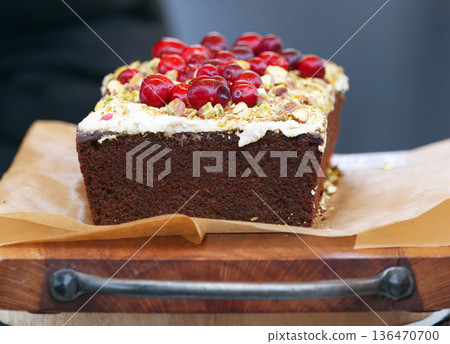 Banana bread with cream and berries at farmers market Banana bread with cream and berries at farmers market 136470700
