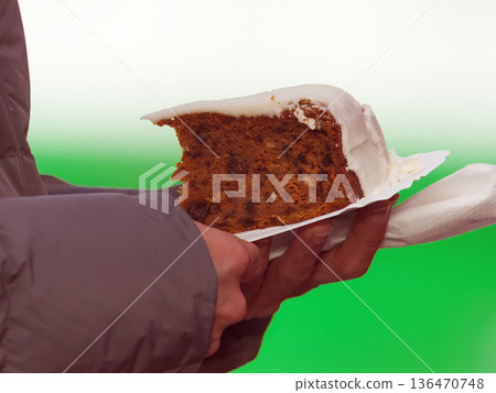 Carrot cake slice held at Naplavka farmers market Carrot cake slice held at Naplavka farmers market 136470748