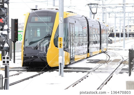 Utsunomiya Hiraishi Station: Light rail and snow scenery Utsunomiya Hiraishi Station: Light rail and snow scenery 136470803