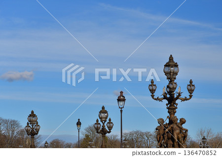 February 4, 2026: The gorgeous street lights of Pont Alexandre III in Paris, illuminated in the winter daylight. 136470852