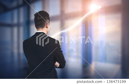 Businessman Analyzing Growth Trends in Modern Office with Graphs and Charts Showing Positive Progress Impute Businessman Analyzing Growth Trends in Modern Office with Graphs and Charts Showing Positive Progress Impute 136473199