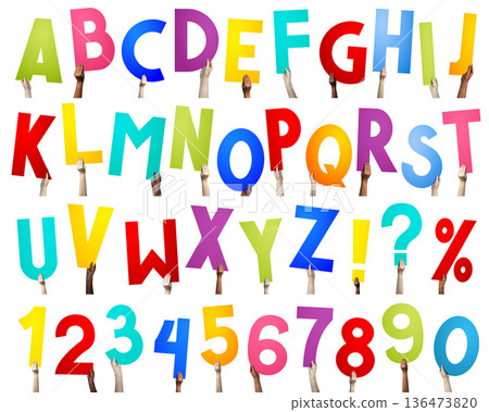 Alphabet - human hands holding colorful letters Alphabet - human hands holding colorful letters 136473820