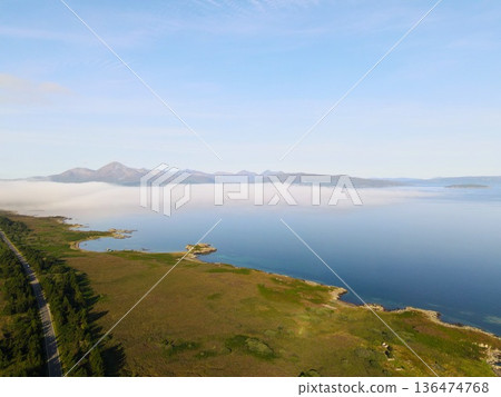 Isle of skye coastal road traveling through scottish landscape 136474768