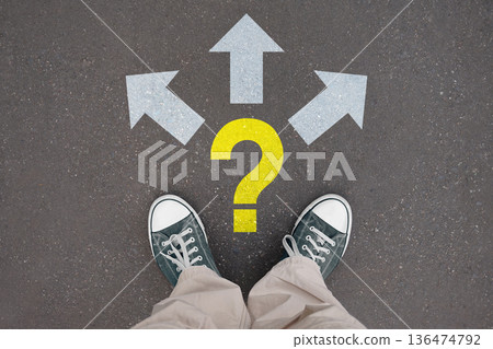 Three arrows and question mark - legs with trainer shoes Three arrows and question mark - legs with trainer shoes 136474792