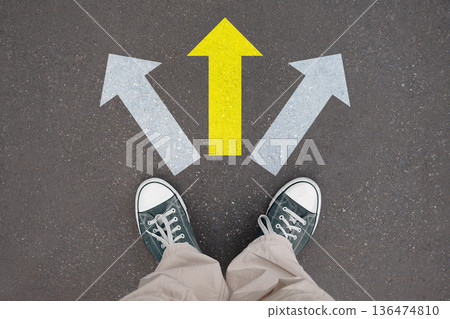 Three arrows, choice concept - legs with trainer shoes 136474810
