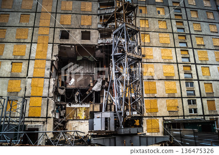Damaged building in Saltivka, Kharkiv, Ukraine Damaged building in Saltivka, Kharkiv, Ukraine 136475326