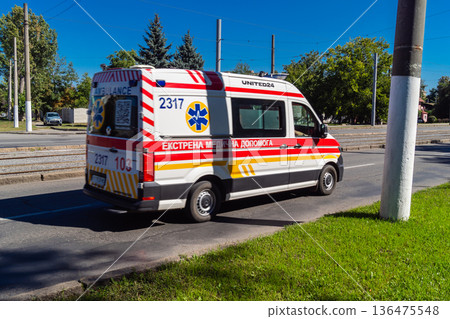 Ambulance rolling in the streets of Kharkiv, Ukraine Ambulance rolling in the streets of Kharkiv, Ukraine 136475548