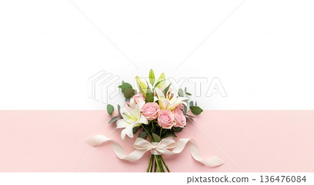 Bouquet composition arranged on a white and pink background Bouquet composition arranged on a white and pink background 136476084