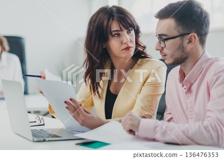 Business team in the office Business team in the office 136476353