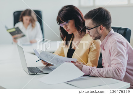 Business team in the office Business team in the office 136476359