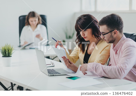 Business team in the office Business team in the office 136476402