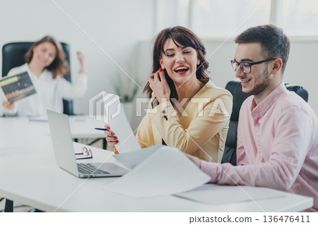 Business team in the office Business team in the office 136476411