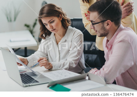 Business team in the office Business team in the office 136476474