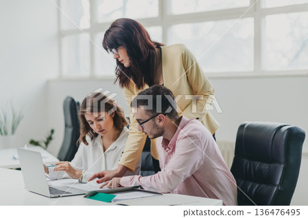 Business team in the office Business team in the office 136476495