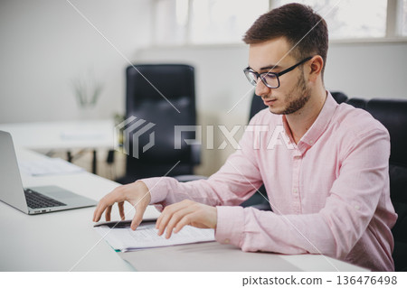 Young man in the office 136476498