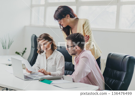 Business team in the office Business team in the office 136476499
