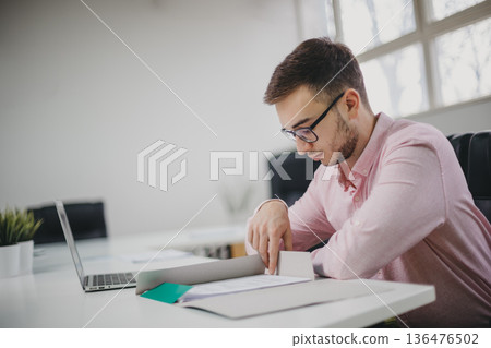 Young man in the office 136476502