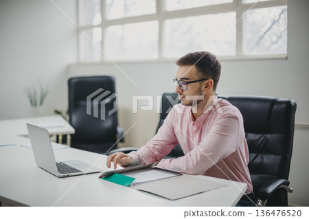 Young man in the office 136476520