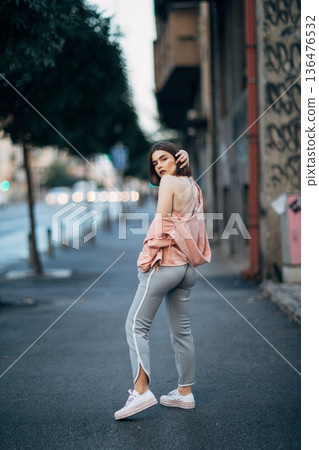 Young girl on street Young girl on street 136476532