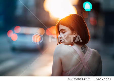 Young girl on street 136476534