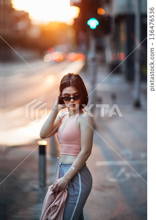 Young girl on street 136476536