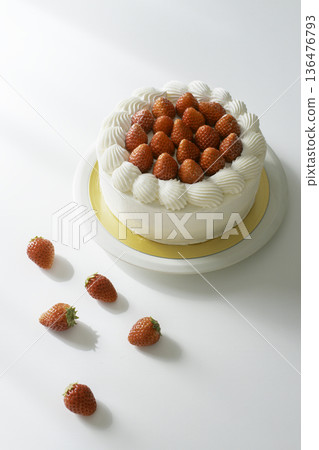 Homemade strawberry shortcake with plenty of white space on a white background. Natural light sweets photography. 136476793