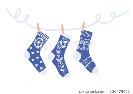 Winter Socks Hanging on Clothespins Seamless Illustration Set with Cozy Seasonal Mood 136479052