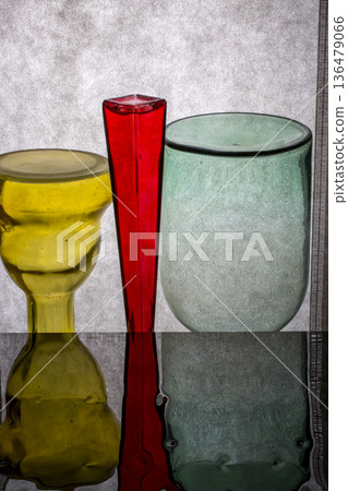 Still life with glassware on a gray-black background Still life with glassware on a gray-black background 136479066