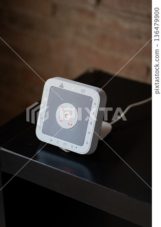 Smart home security system providing digital protection and advanced automation for residential defense, connecting with family safety and modern technology keypad on a dark surface 136479900