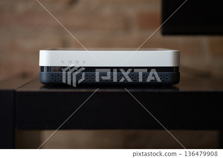 Wireless router providing home network connectivity, delivering modern internet access for digital communication and smart devices in a contemporary living space 136479908