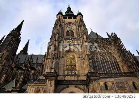 Prague Castle, St. Vitus Cathedral facade, and magnificent Gothic architecture 136480253
